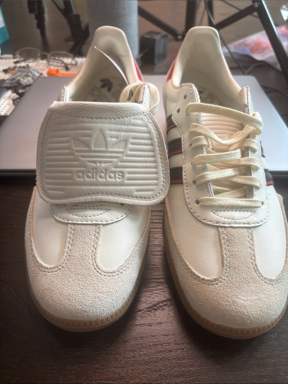 adidas Samba sneakers in off-white with black & red stripes